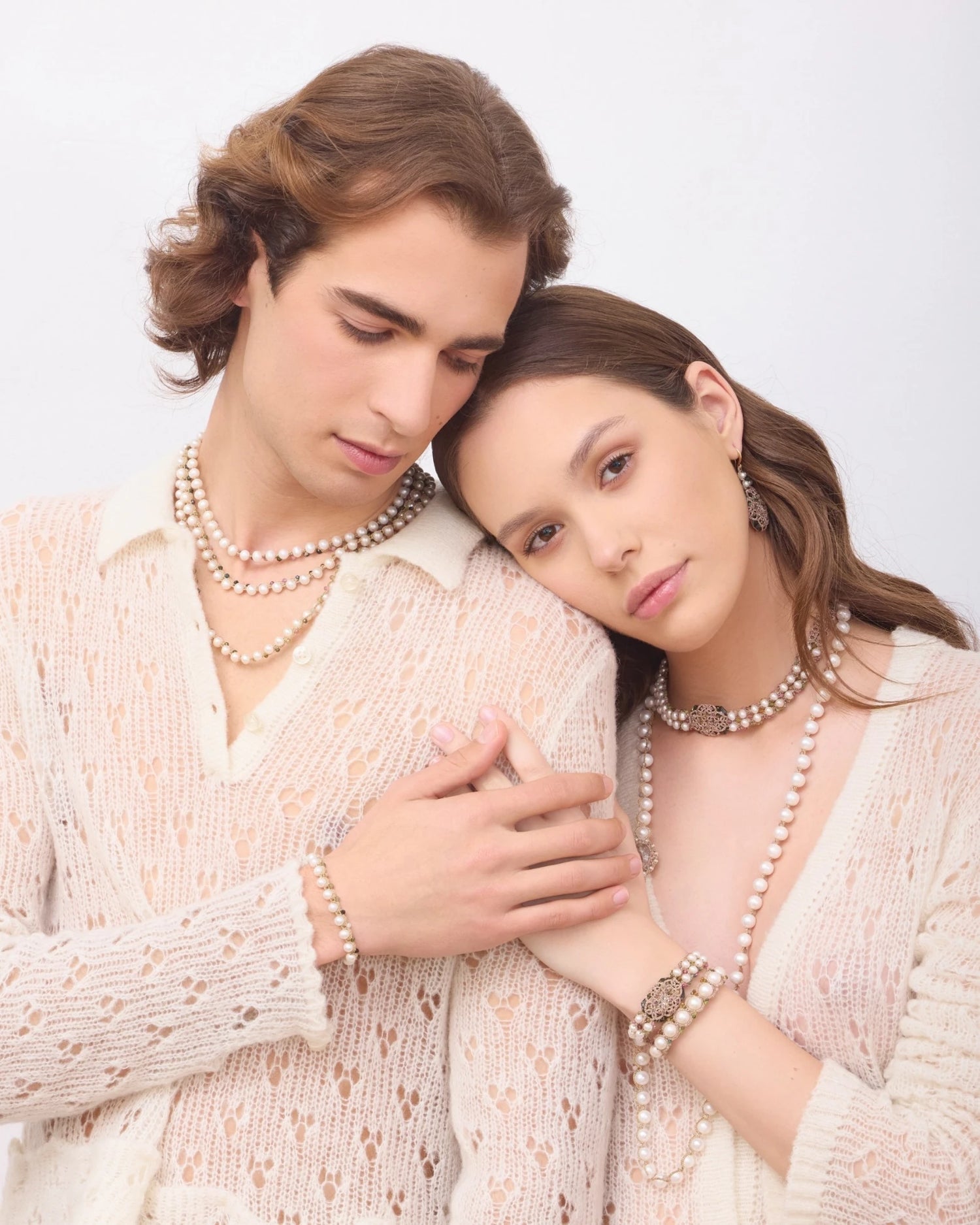 Silk and multicolor tourmaline choker with layered freshwater pearls, detailed clasp, and intricate pearl detailing.