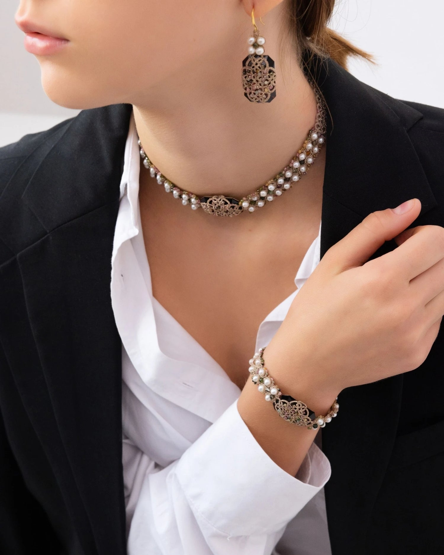 BARI EARRINGS in Silk, Gold, Silver color White angle view with superior finishes and refined design