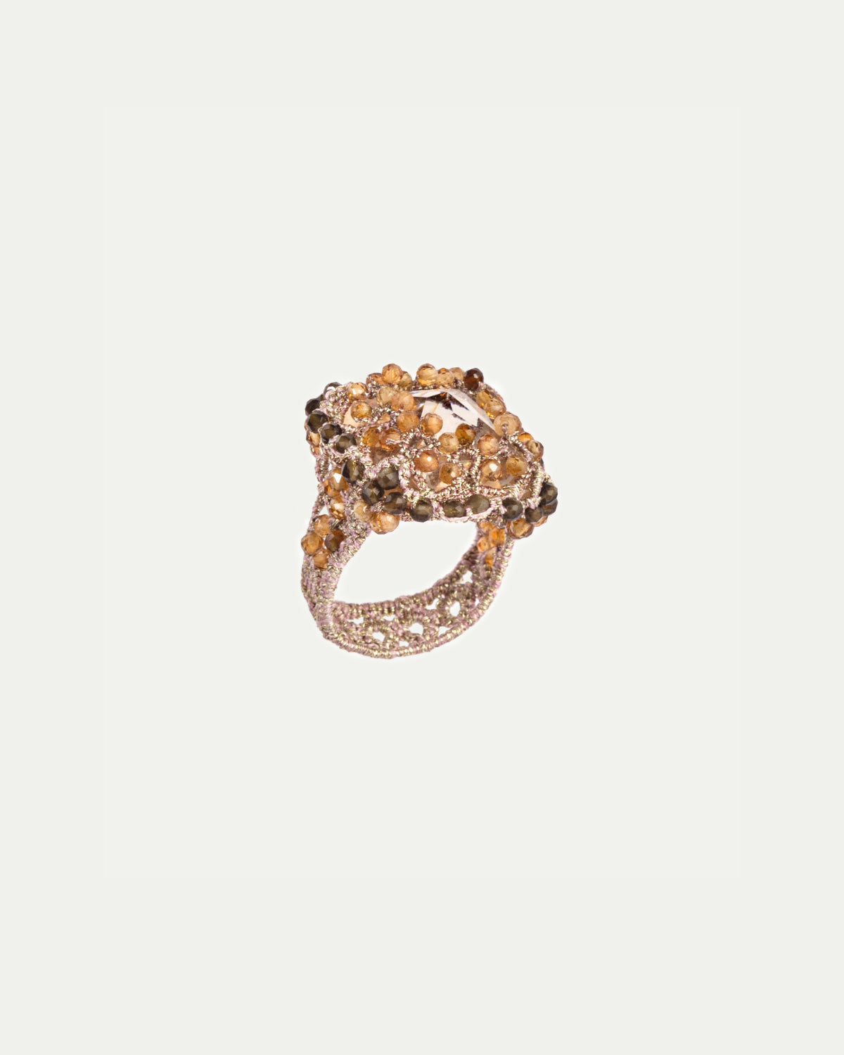 CAROL RING with orange garnet, obsidian gemstones, silk threads, gold-plated silver, intricate design.