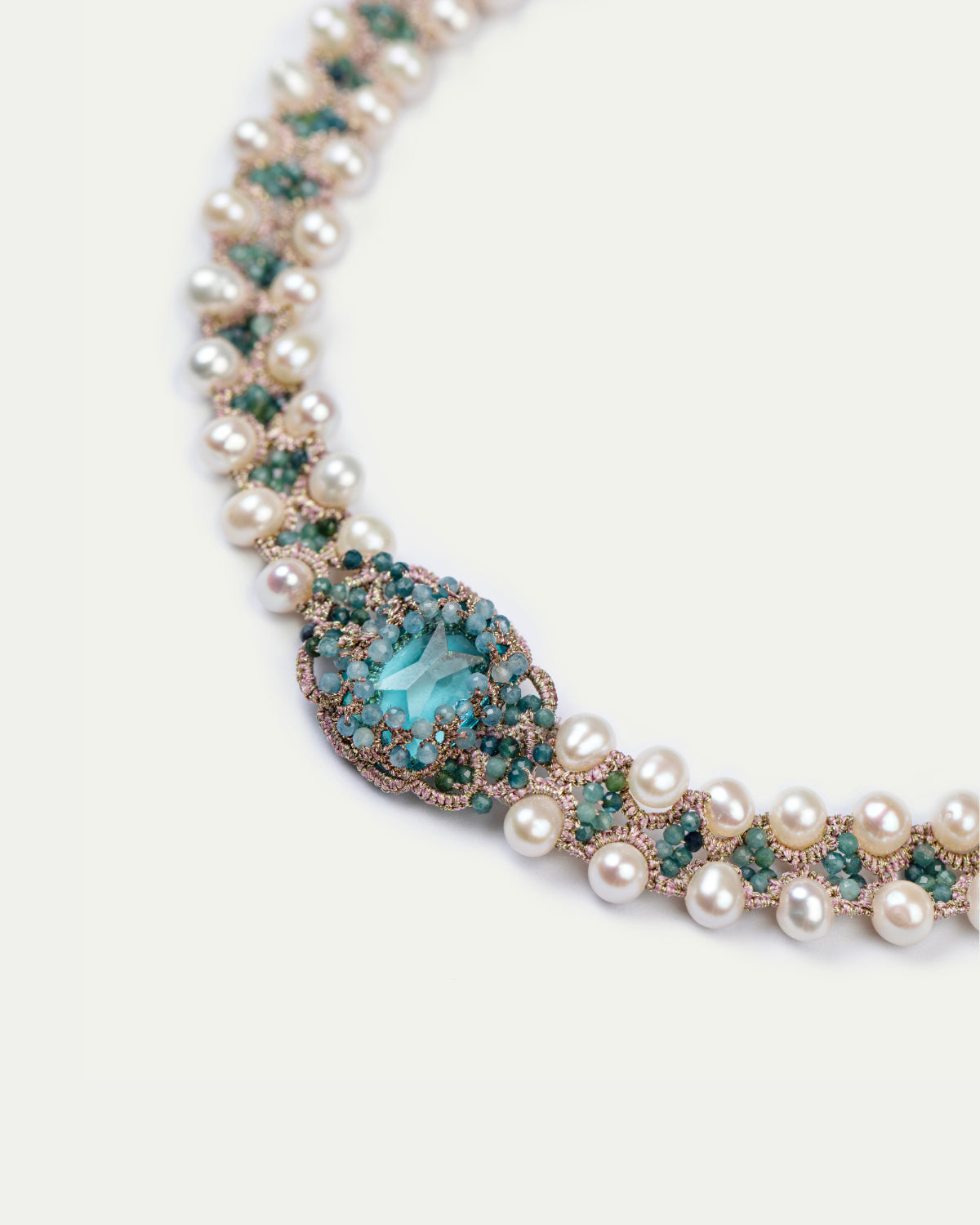 Blue CLEO choker in silk with freshwater pearls and crystals, intricate detail showcasing texture.