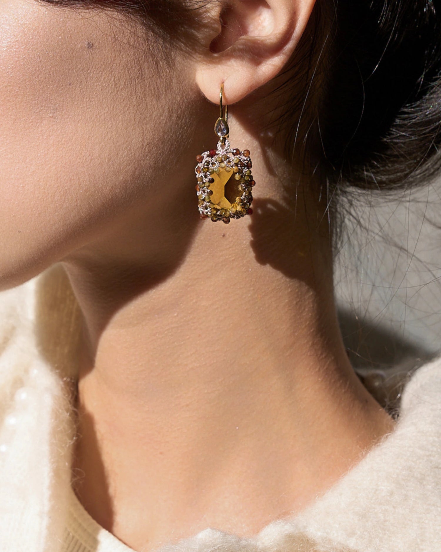 CONSTANCE EARRINGS in Silk, Gold, Silver color Gold side view with decorative details and quality finishes