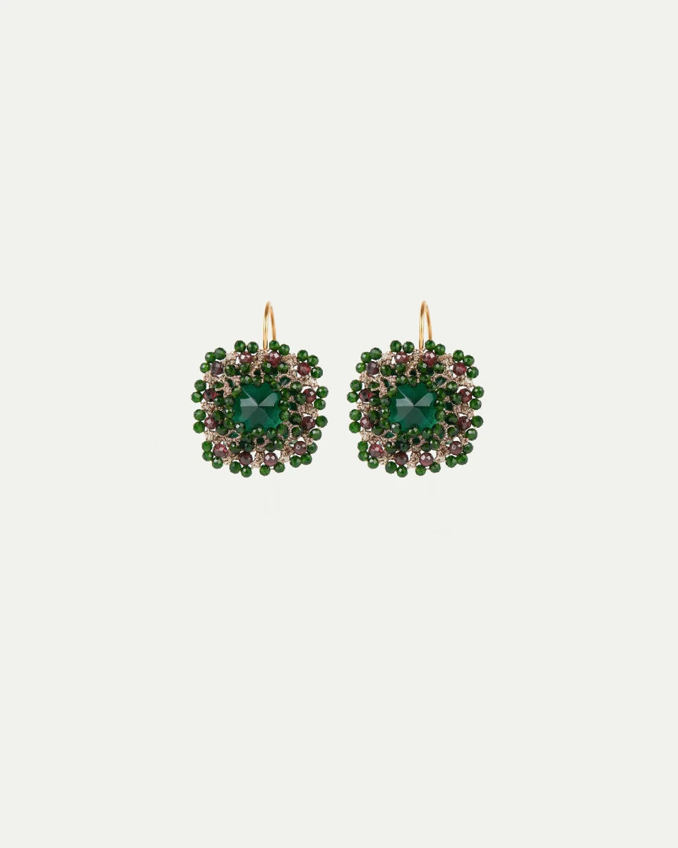 Green silk and crystal Delphine earrings with gold hooks, accented by garnet and silver detailing.
