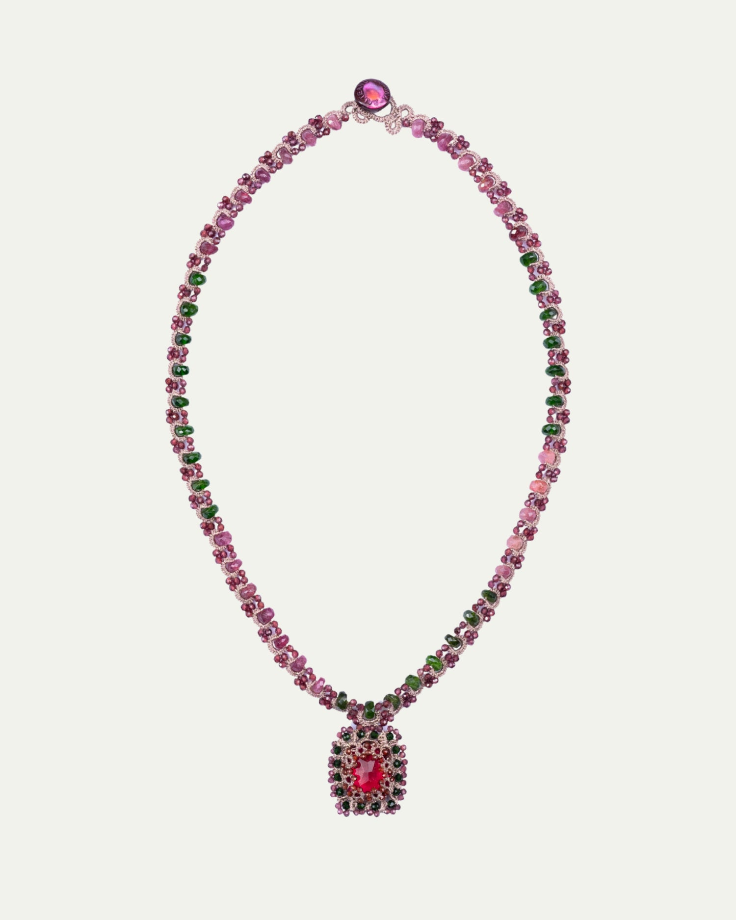 Red Delphine necklace with faceted red gemstone pendant, pink and green crystal beads, elegant silver clasp.