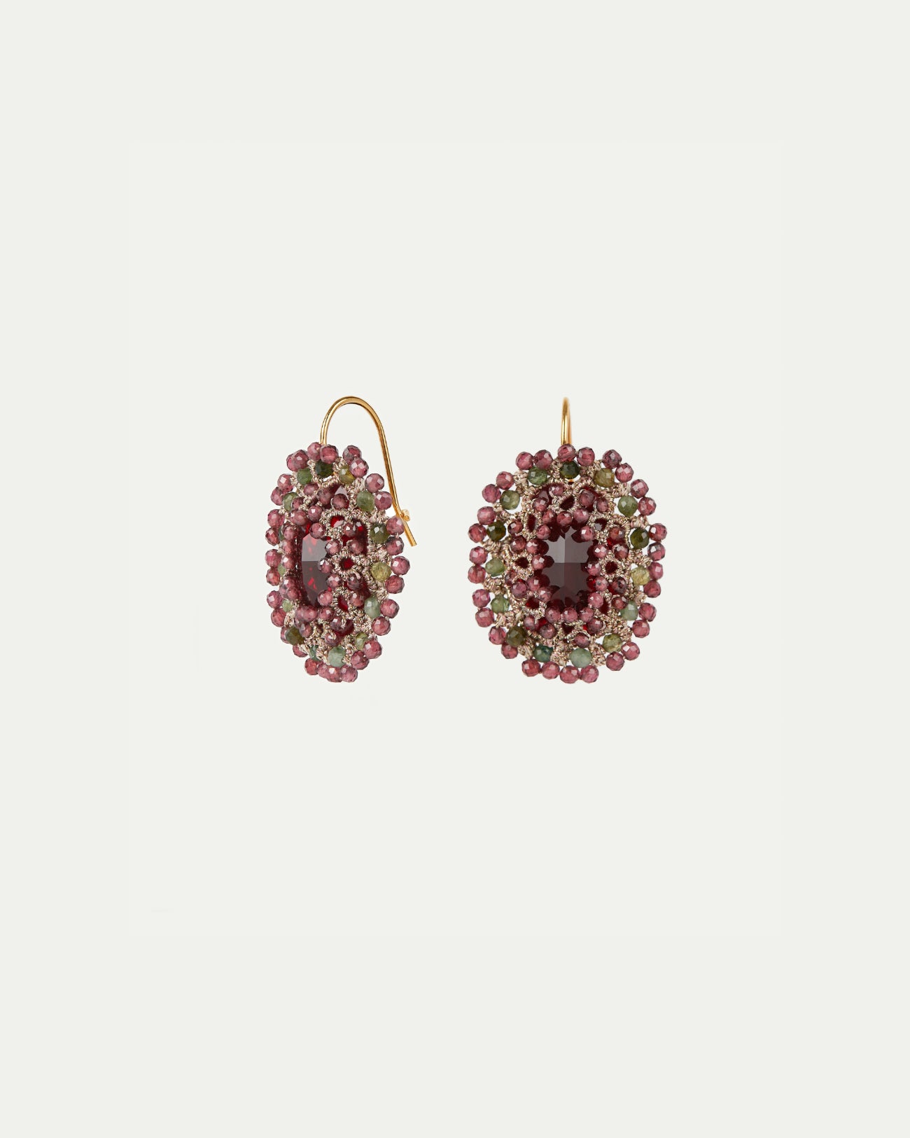 Red silk and gold ECATERINA earrings with crystal and garnet details, intricate texture and elegant design.