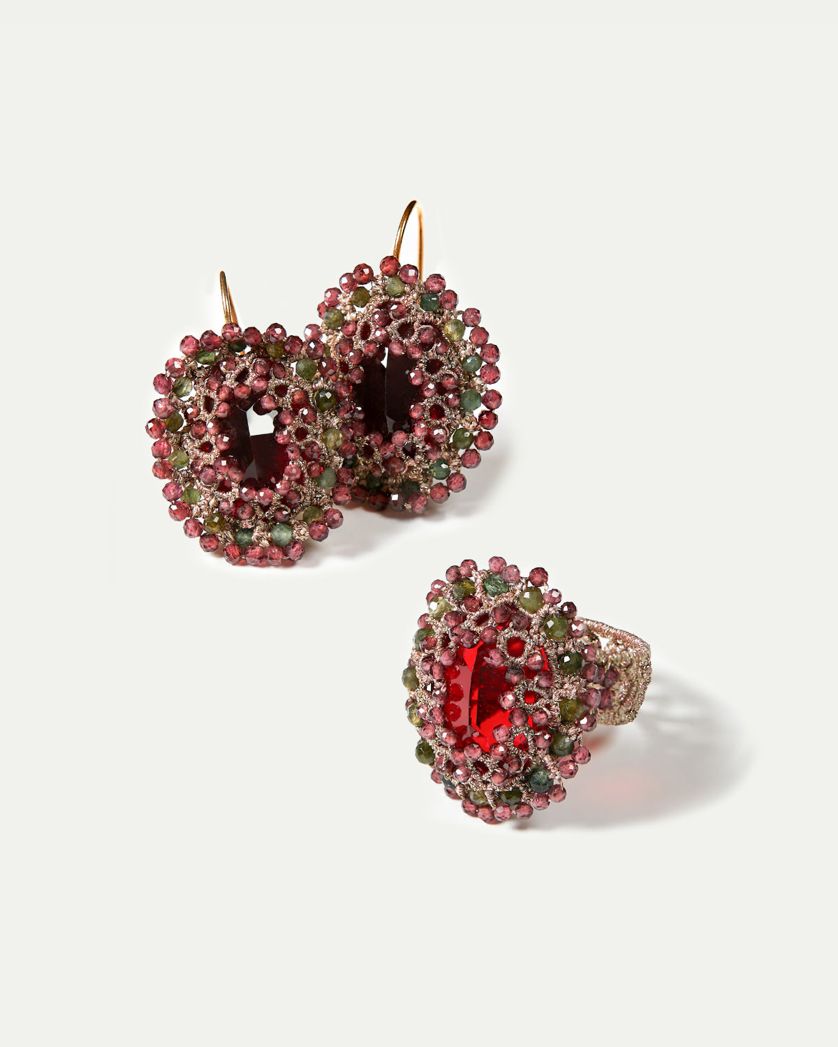 ECATERINA RING in Silk, Crystal, Garnet color Red close-up view with premium look and attention to detail