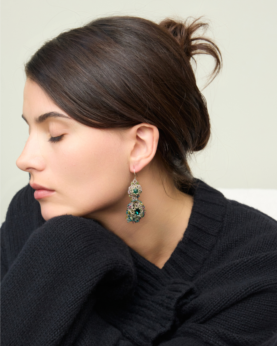 ELINA Earrings with green gemstones, silver hooks, silk thread detailing, worn by model with dark hair.