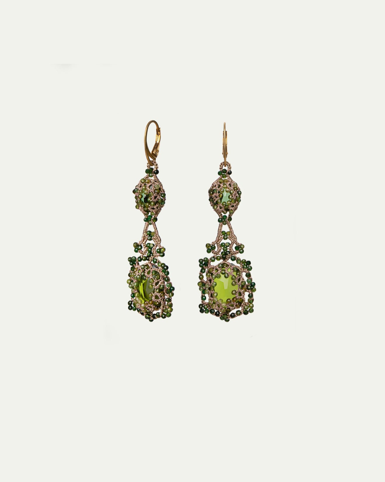 Green silk gold earrings with crystal and tourmaline detail, intricate texture and craftsmanship.