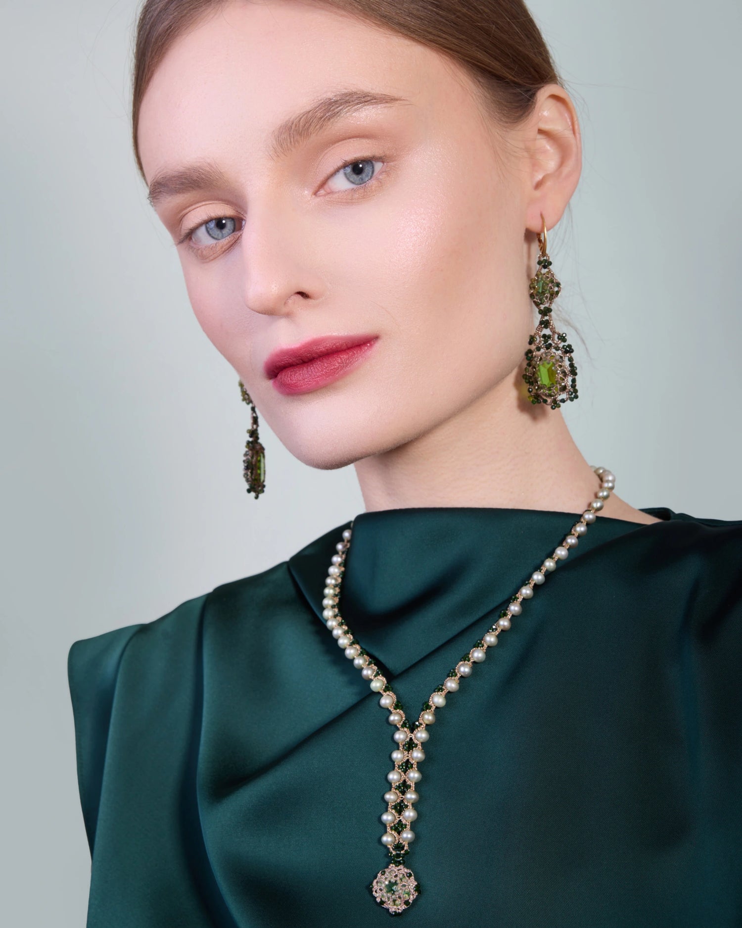 Green silk and crystal Eloise earrings with gold and silver detail, accented by tourmaline stones.