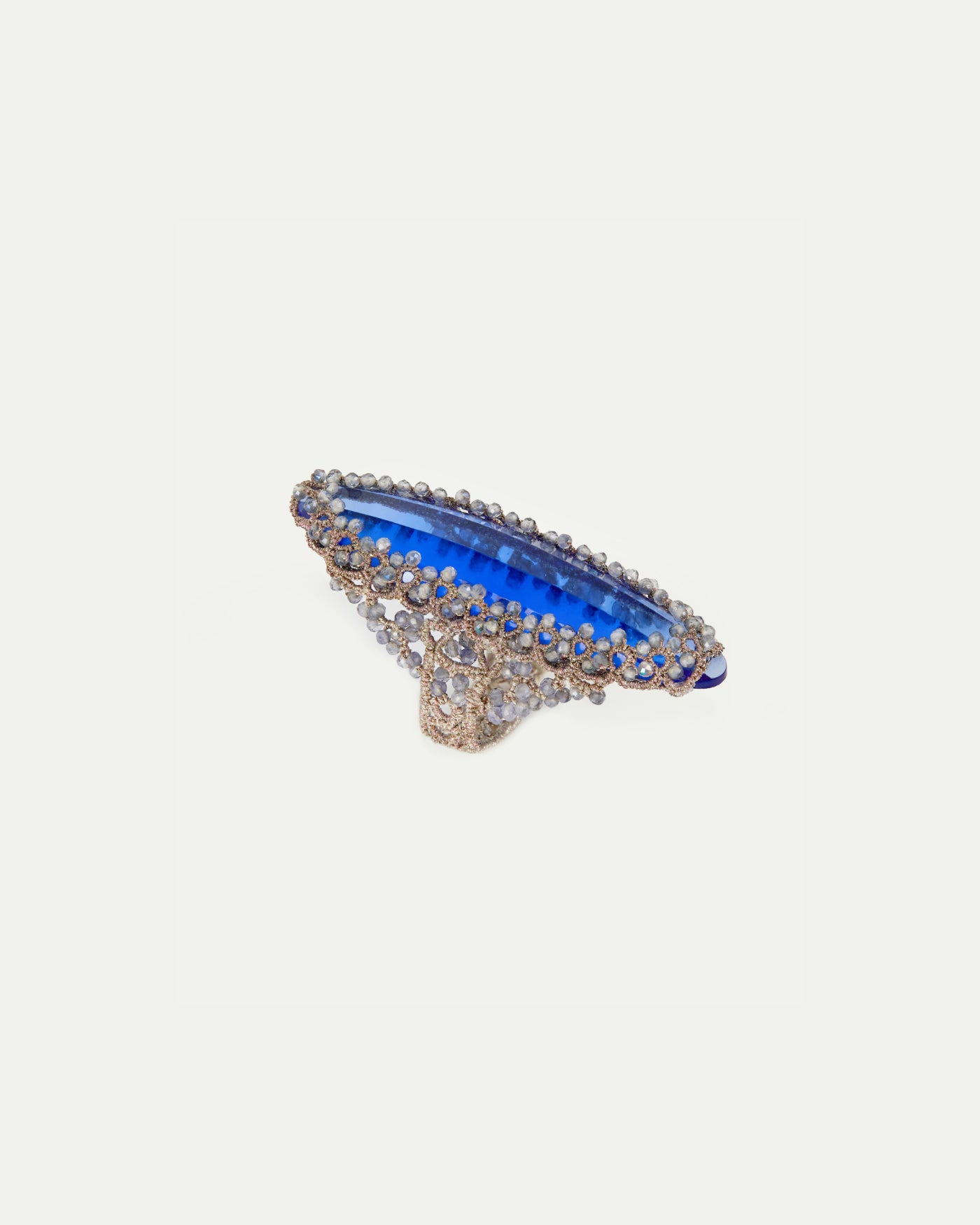 HEPBURN RING in Silk, Topaz, Glass color Blue angle view with superior finishes and refined design