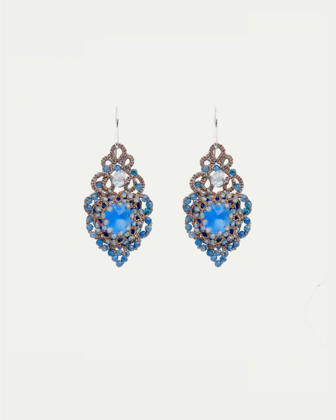 HERA EARRINGS in Silk, Silver, Crystal color Blue side view with decorative details and quality finishes