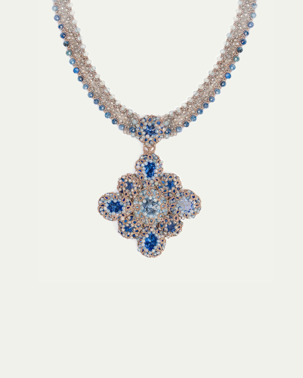 LINDA NECKLACE with blue gemstones, crystals, aquamarine, kyanite, and silk thread, intricate design with pearl accents.