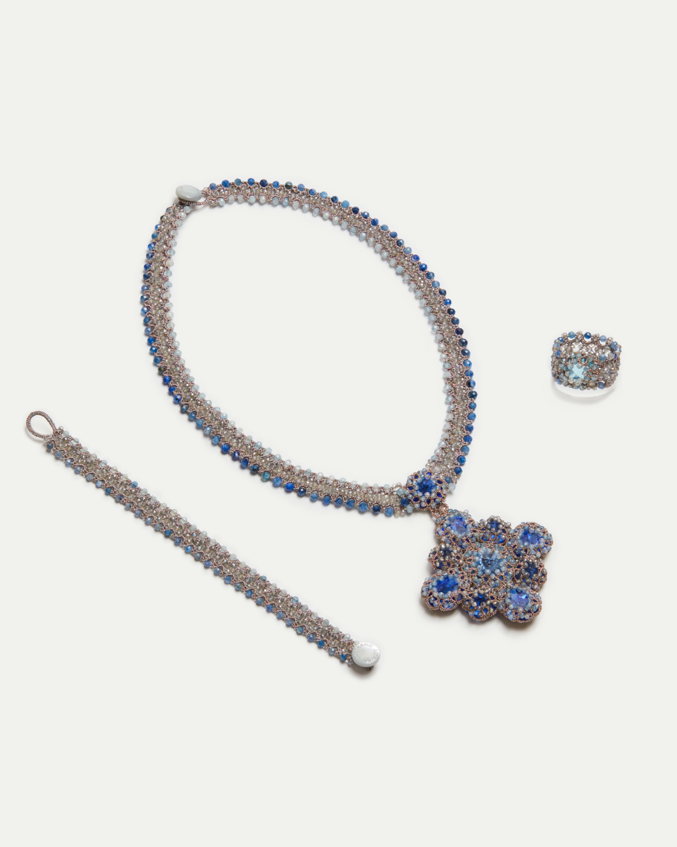 Blue silk ring with crystals, kyanite, aquamarine, size 55, intricate texture and sparkling detail.