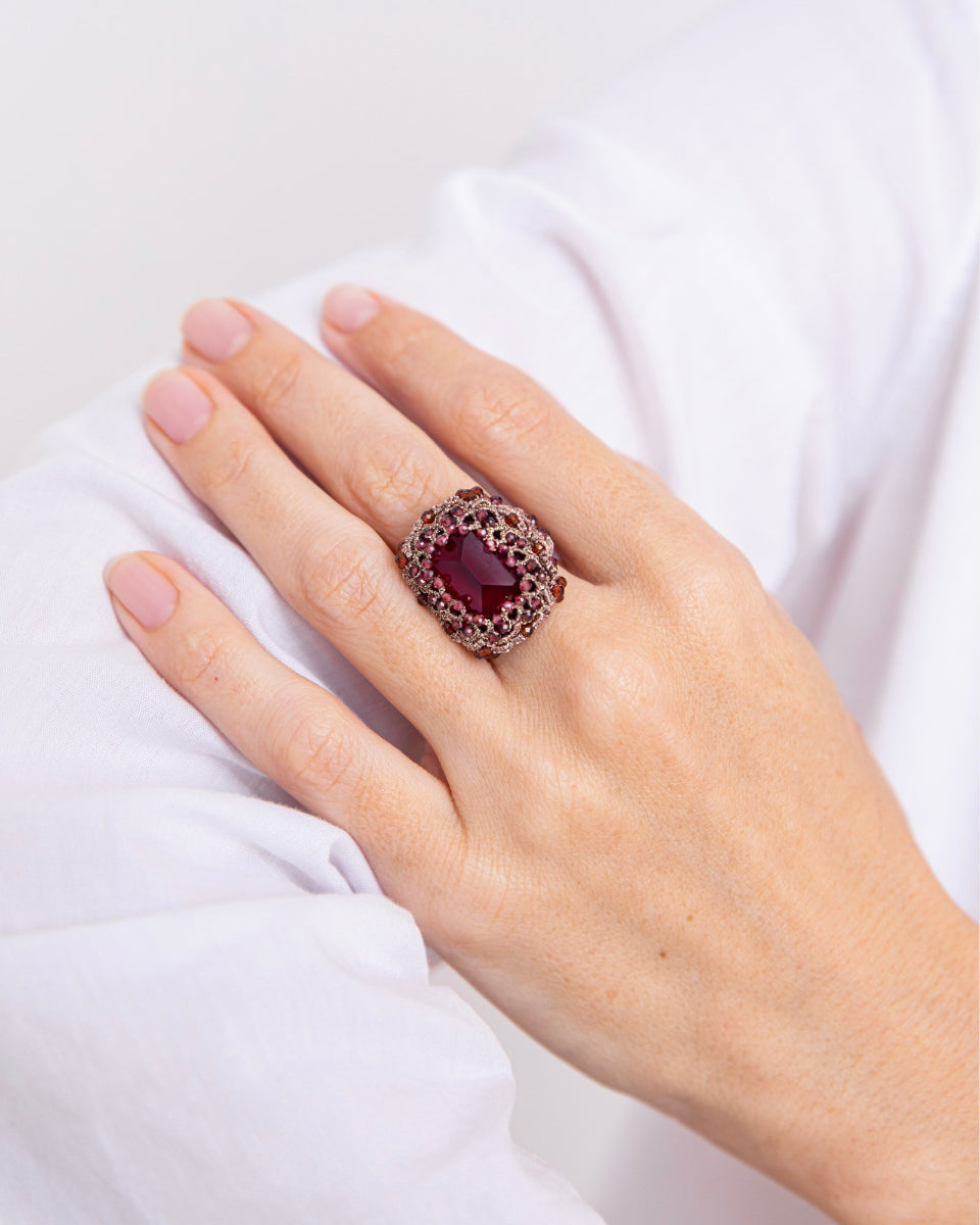 LOLA RING in Silk, Crystal, Garnet color Red angle view with superior finishes and refined design