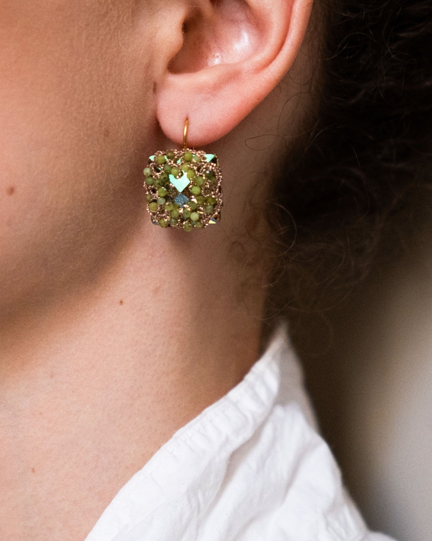 LORELEI EARRINGS in Silk, Gold, Silver color Green close-up view with premium look and attention to detail