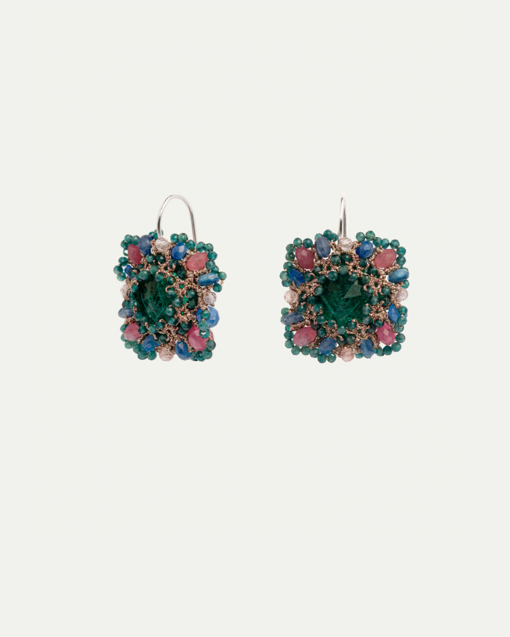 MEG EARRINGS in Silk, Silver, Crystal color Green close-up view with premium look and attention to detail
