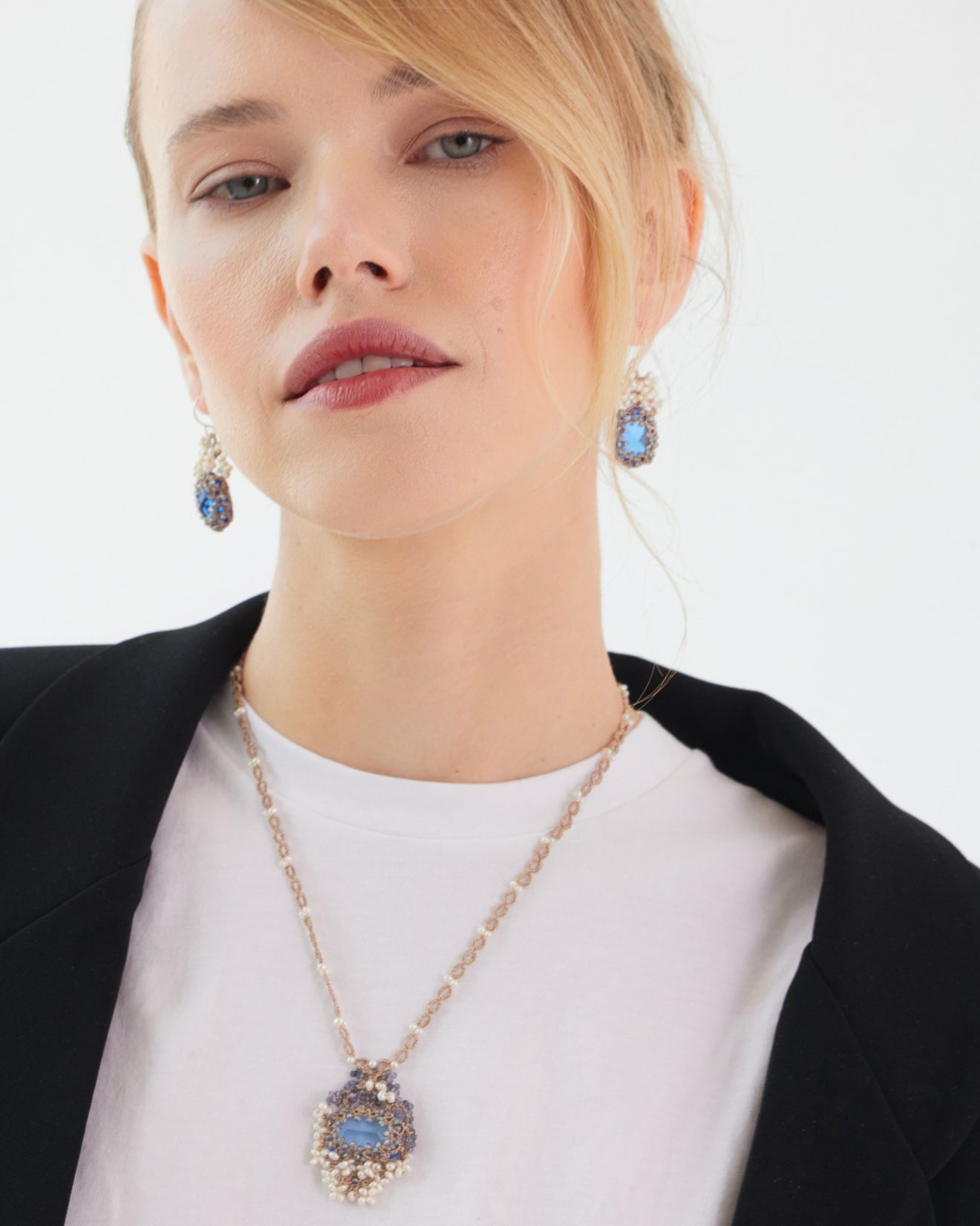 NAYA EARRINGS in Silk, Gold, Silver color Blue side view with decorative details and quality finishes