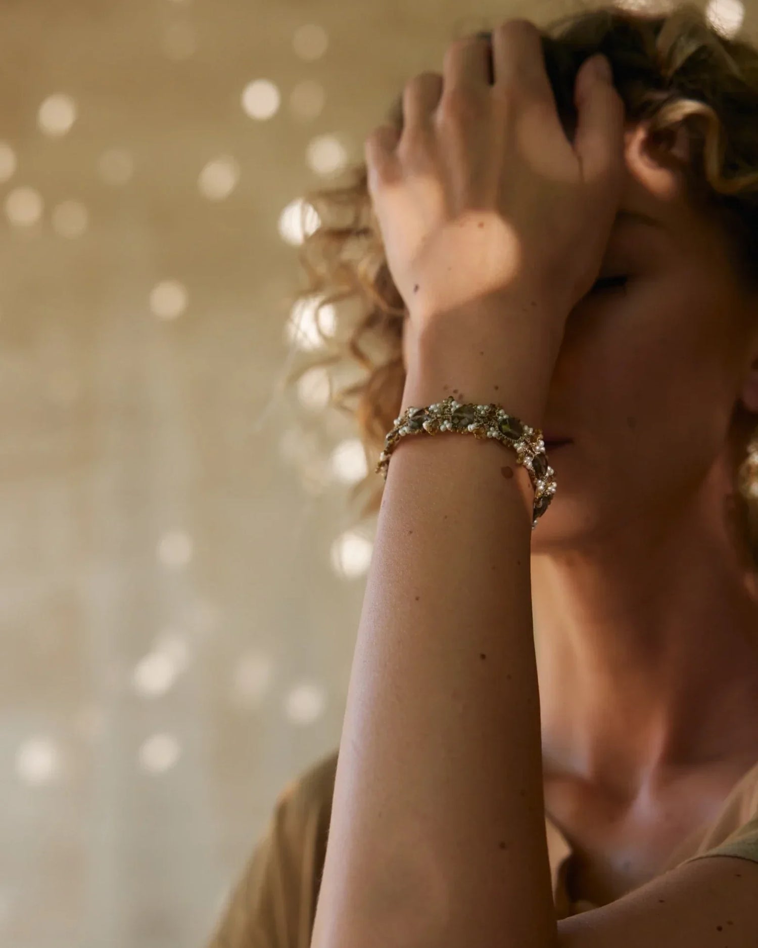 PAIGE BRACELET in Silk, Pearl, Pearls color Gold angle view with superior finishes and refined design