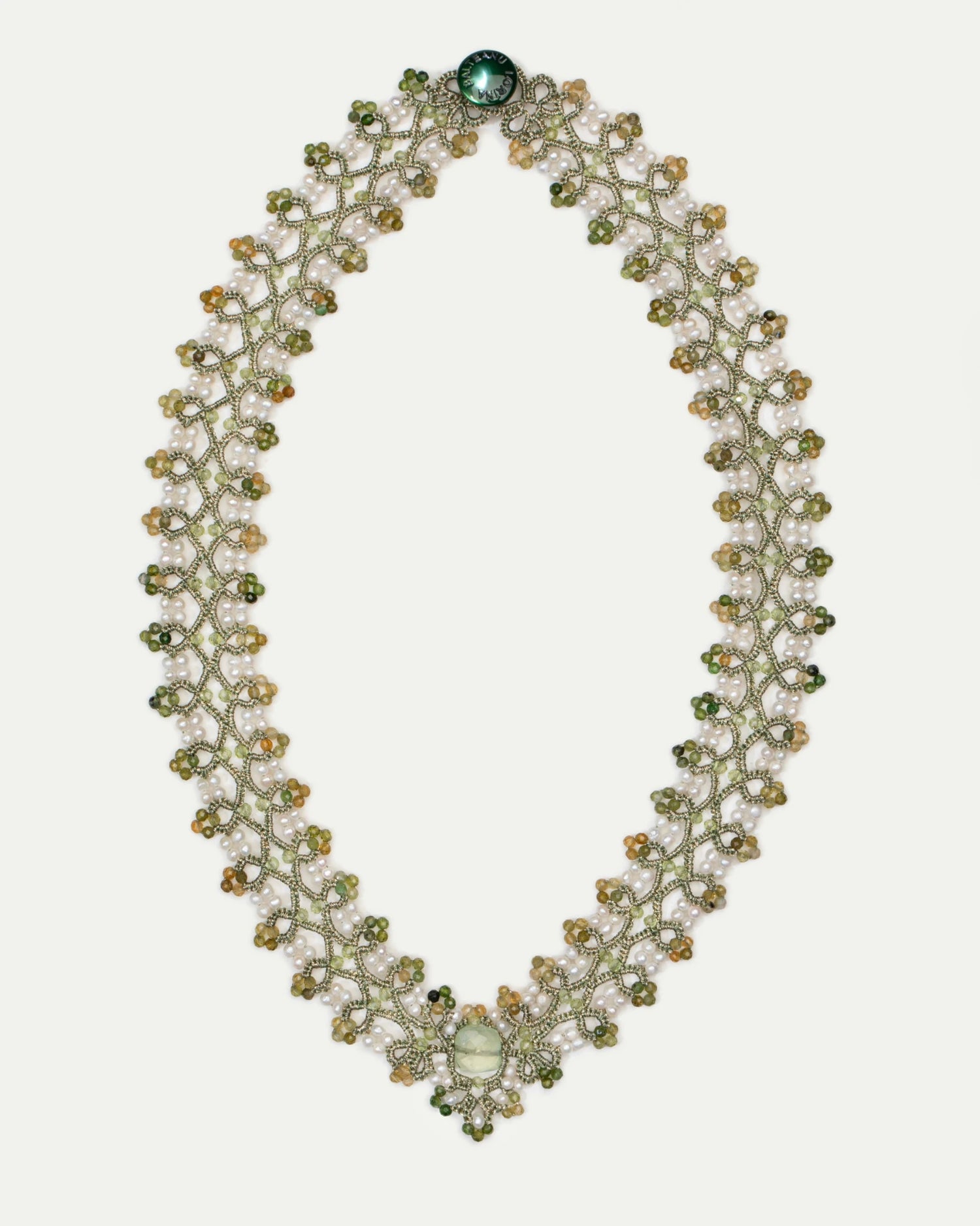 Green PAIGE necklace with ornate beaded pattern, featuring pearls and a central gemstone in a delicate woven design.