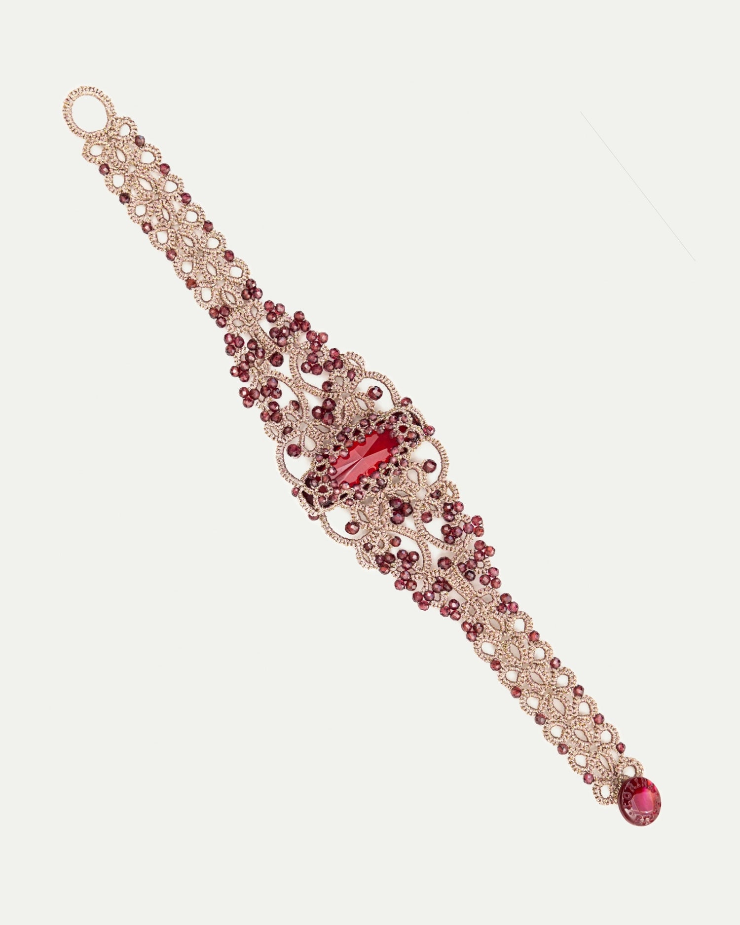 ROZALINA BRACELET in Silk, Pearl, Crystal color Red close-up view with premium look and attention to detail