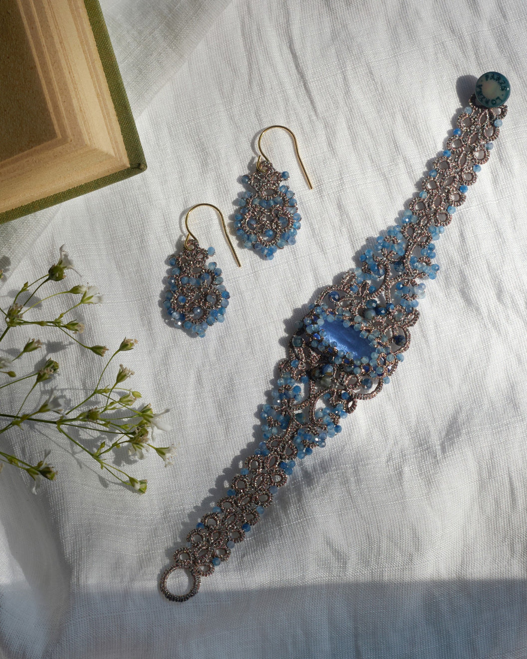 ROZALINA BRACELET in Silk, Pearl, Crystal color Blue front view with elegant and refined design