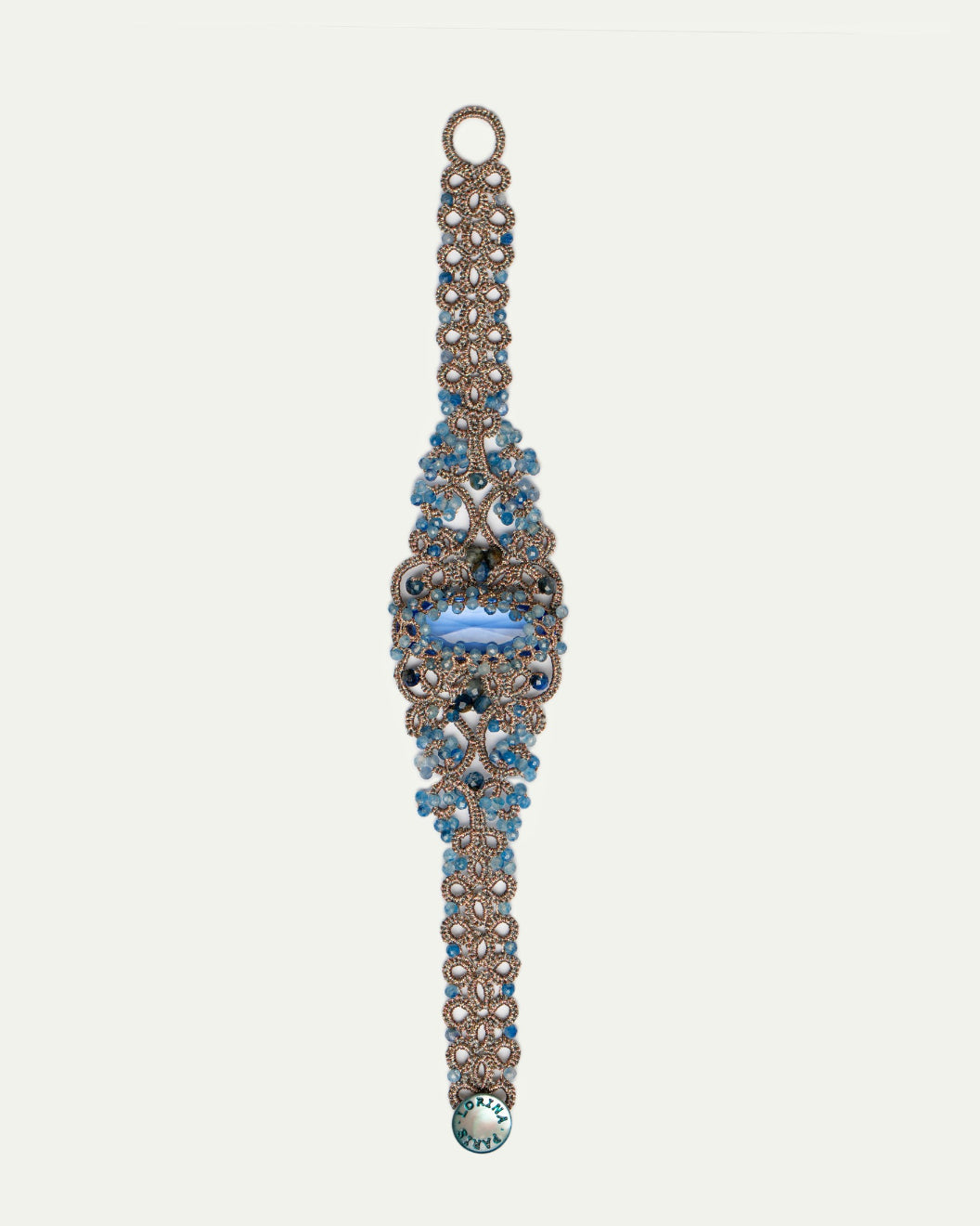 ROZALINA BRACELET in Silk, Pearl, Crystal color Blue side view with decorative details and quality finishes
