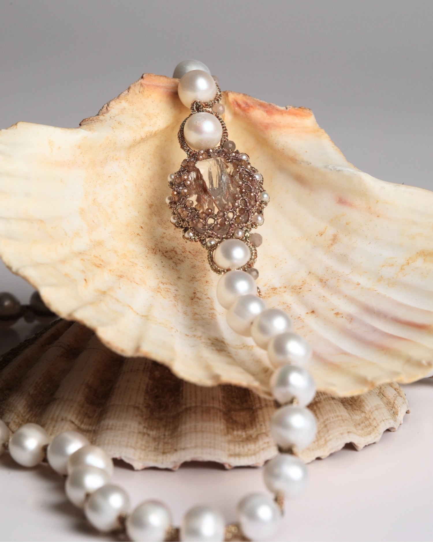 SHAYLA PENDANT in Pearl, Pearls, Crystal color Gold close-up view with premium look and attention to detail