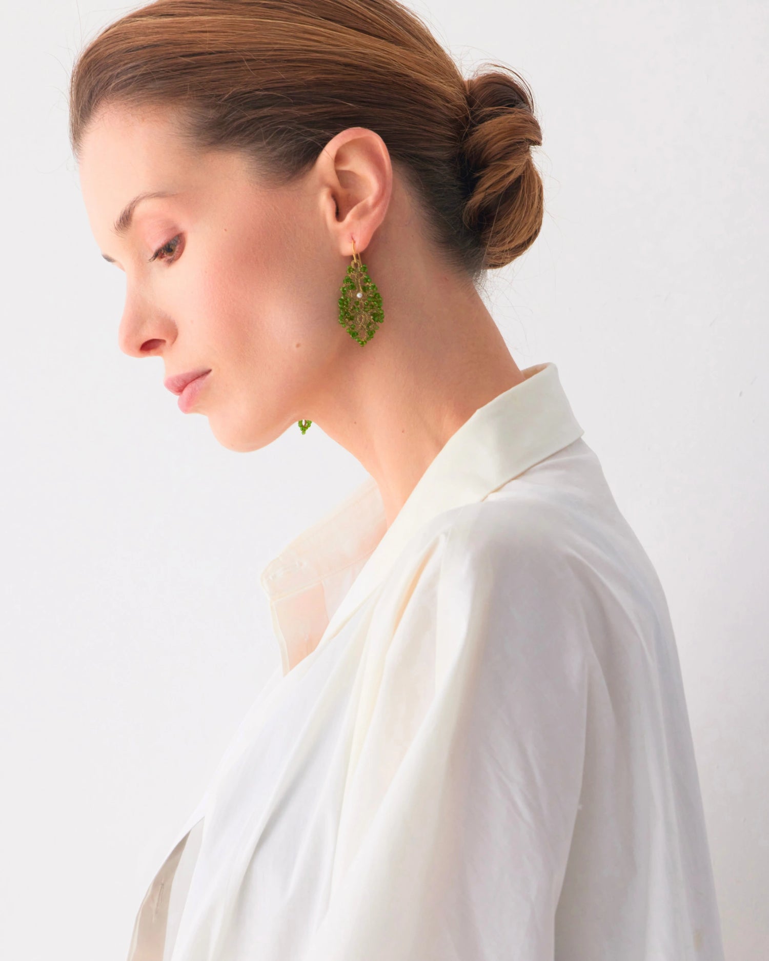 TRIADA EARRINGS in Silk, Gold, Silver color Green close-up view with premium look and attention to detail
