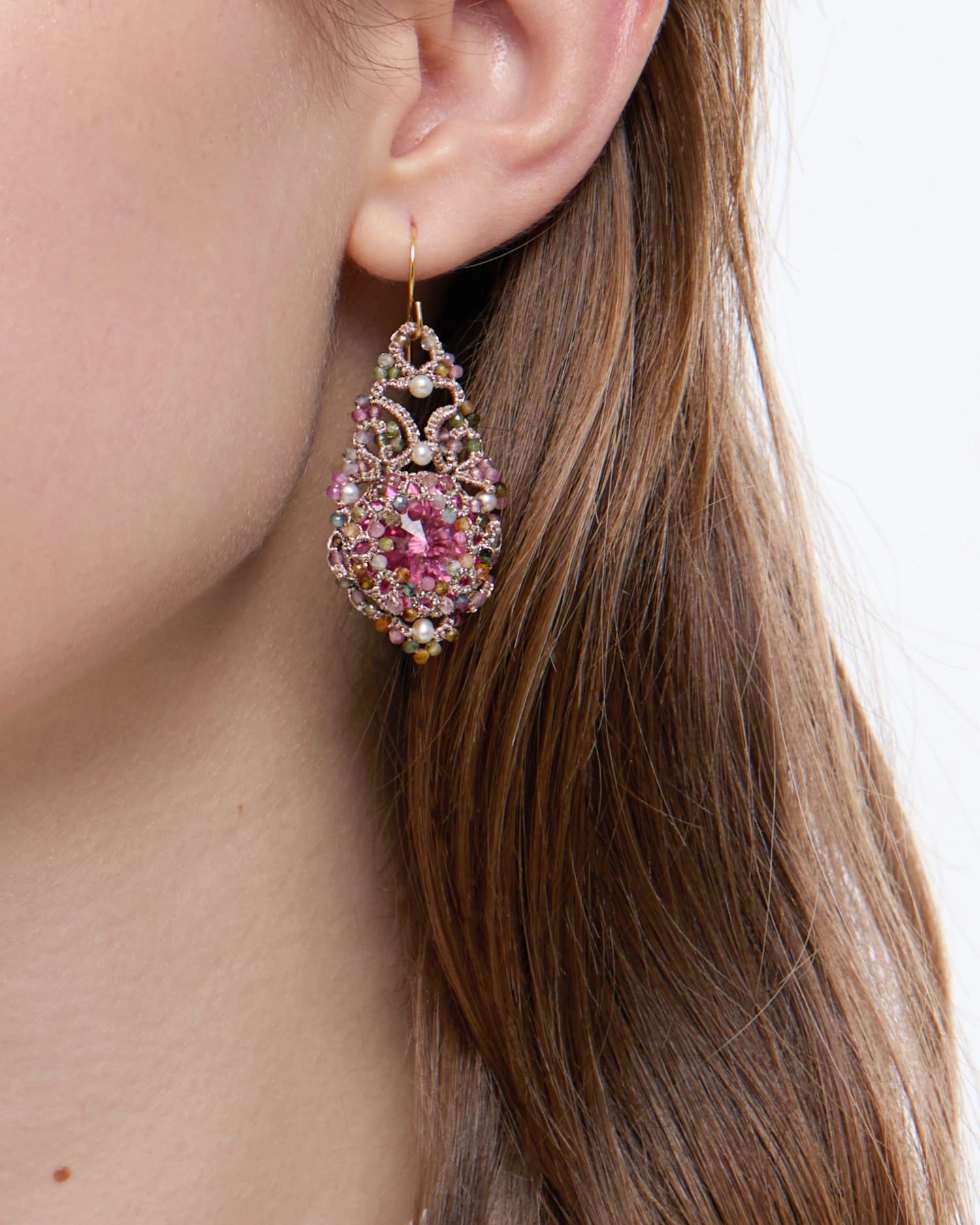 Rose Valentina earrings featuring intricate pink gemstones, pearls, and gold-plated elements in teardrop design.