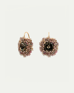 Multicolor silk earrings with intricate beadwork, central dark gemstone, and gold hooks.