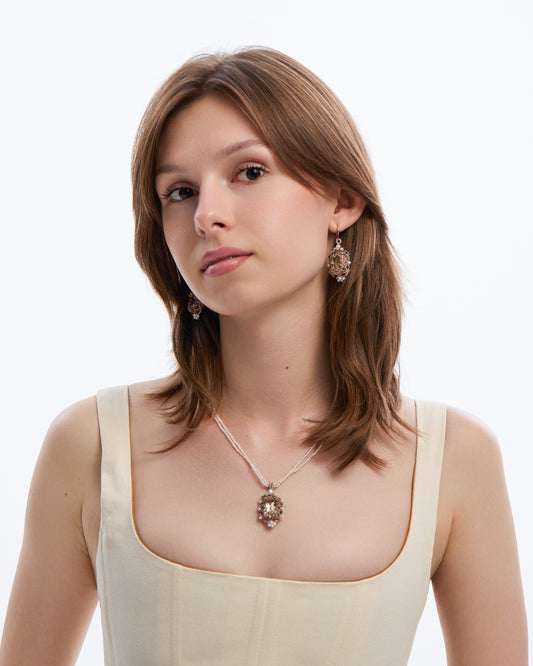AUDREY NECKLACE in Silk, Pearl, Pearls color White side view with decorative details and quality finishes