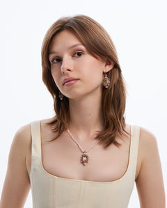 AUDREY NECKLACE in Silk, Pearl, Pearls color White side view with decorative details and quality finishes