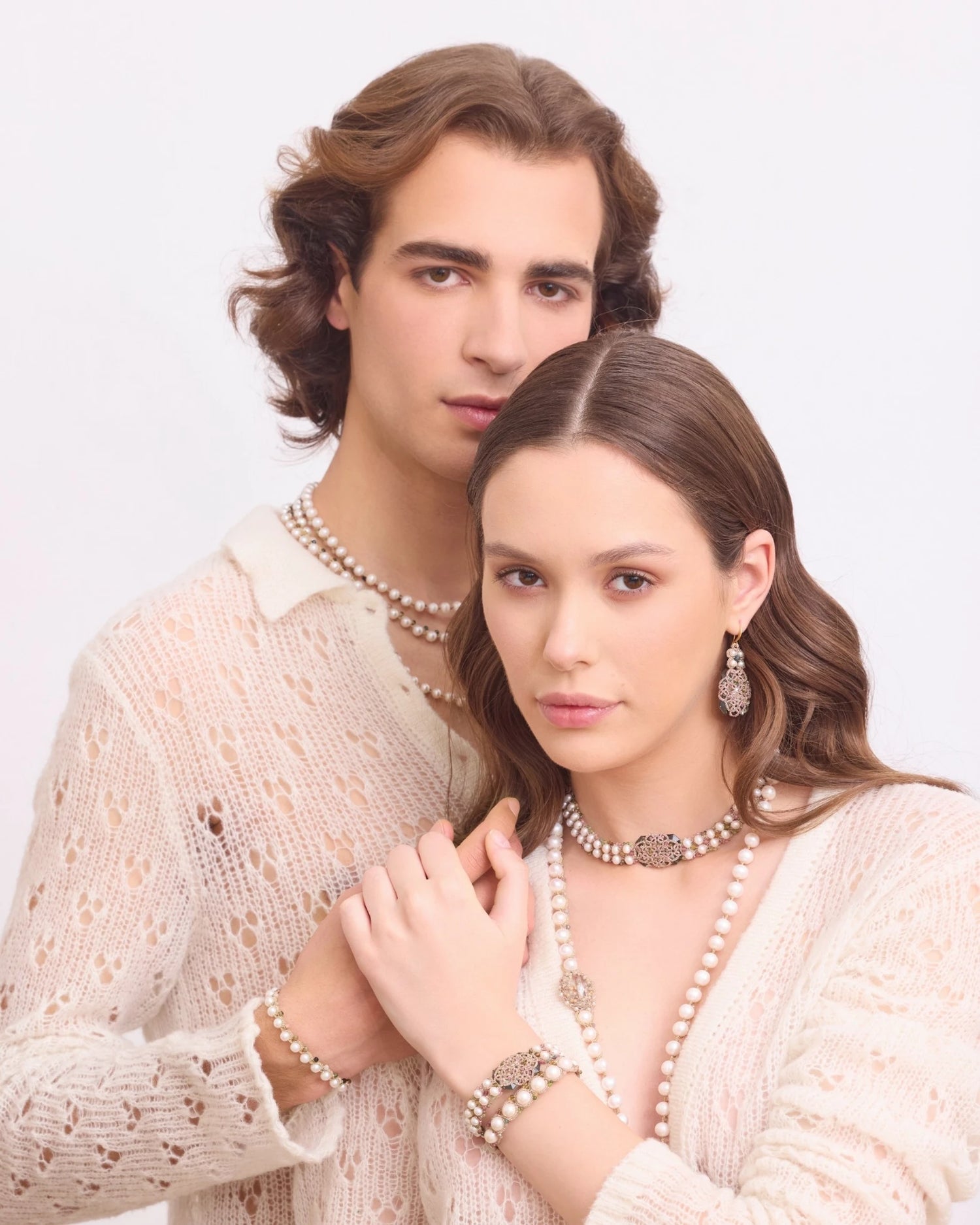 Silk and freshwater pearl choker with multicolor tourmaline accents, detailed texture and elegant design.