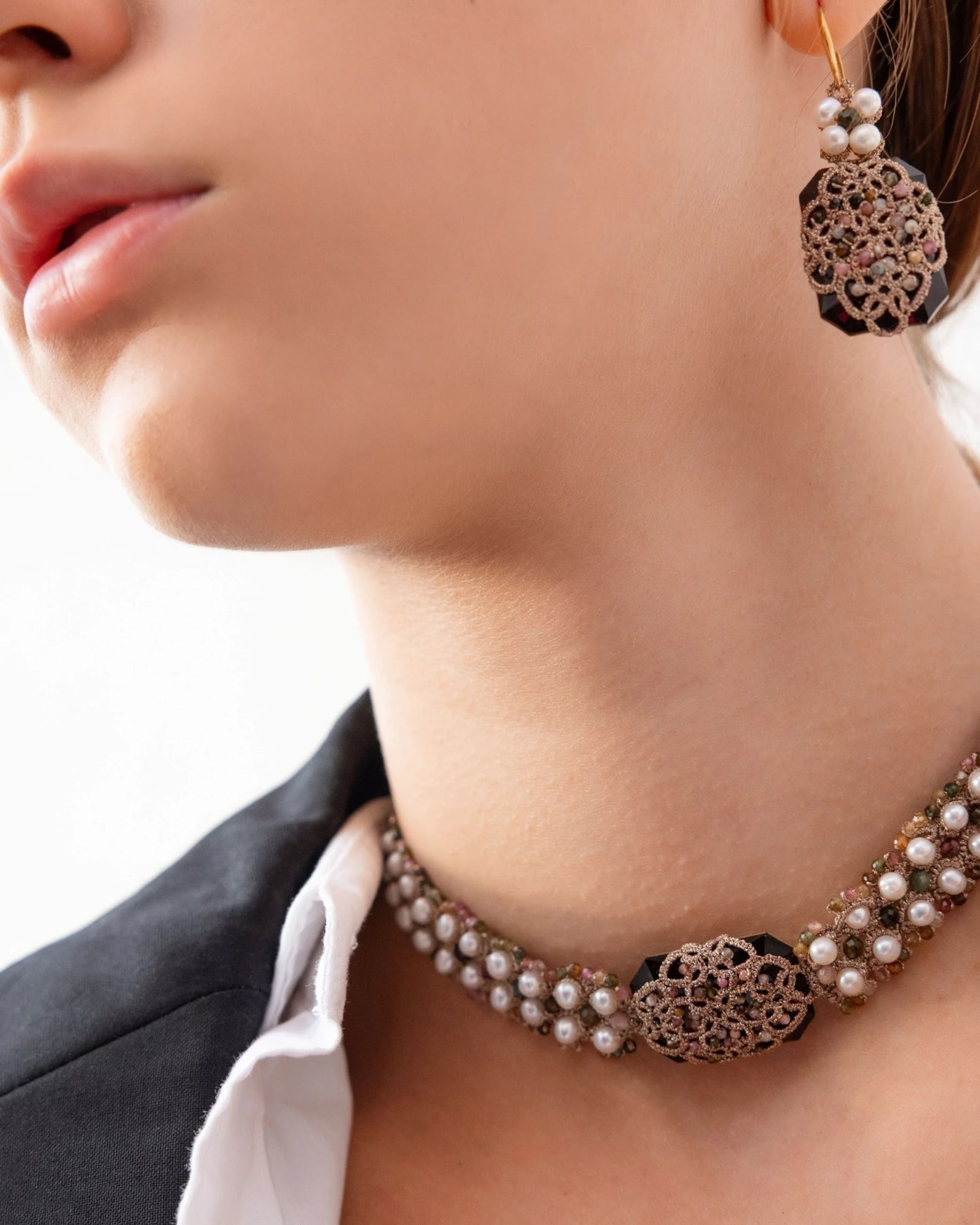 White silk BARI Earrings with gold, silver detailing, pearls, freshwater pearls, intricate texture detail.