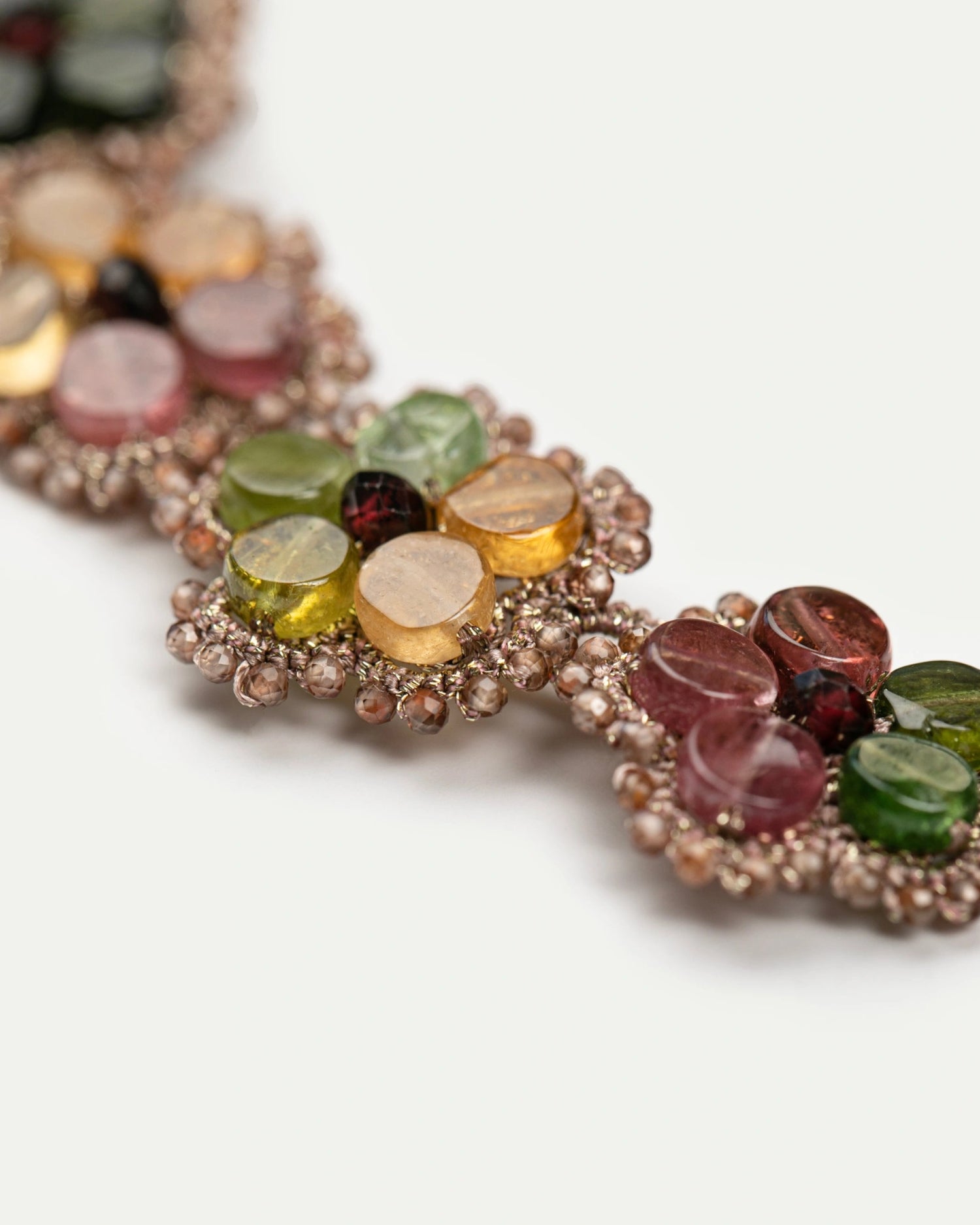 CALLA NECKLACE in Silk, Pearl, Garnet color Gold close-up view with premium look and attention to detail