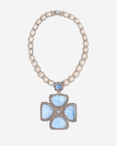 Blue Cassiopeia necklace with pearl beads, silver accents, and intricate cross-shaped blue gemstone pendant.