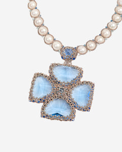 Blue silk and crystal necklace with pearl detail, featuring freshwater pearls and intricate texture.
