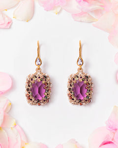 CONSTANCE EARRINGS with multicolored sapphires, purple crystal, gold-plated silver hooks, surrounded by rose petals.