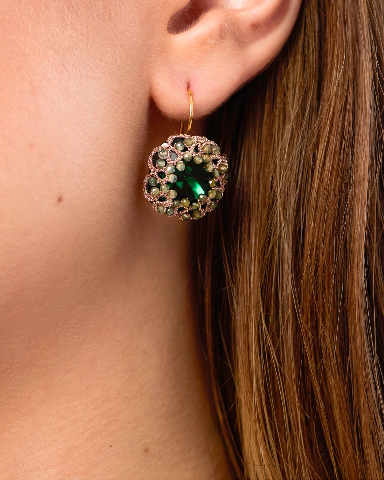 DANI Earrings with green sapphire gemstones, gold-plated silver hooks, silk threads, and crystal embellishments.