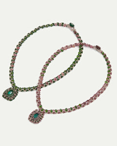 Green Delphine Necklace with silk, pearl, crystal, and garnet detailing in intricate textures and patterns.