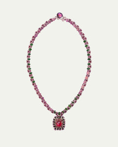 Red Delphine necklace with faceted red gemstone pendant, pink and green crystal beads, elegant silver clasp.