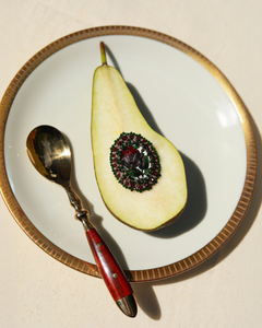 ESTHER BROOCH on halved pear, garnet gemstones, vintage glass, silver pin, silk threads, gold-rimmed plate, wooden spoon