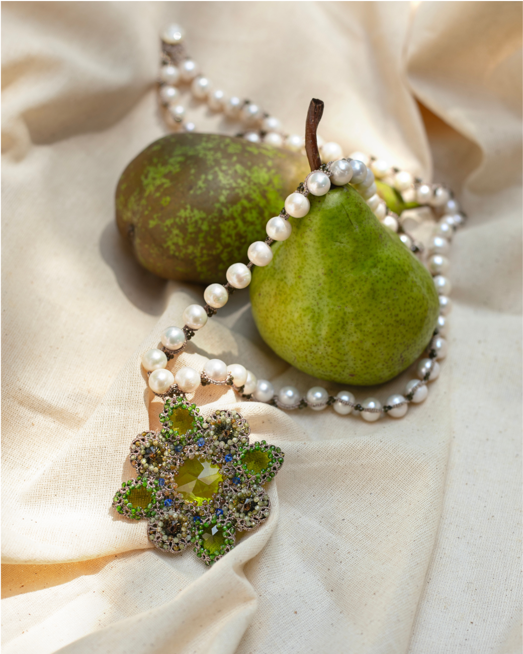 EVA PENDANT in Silk, Pearl, Pearls color Green side view with decorative details and quality finishes