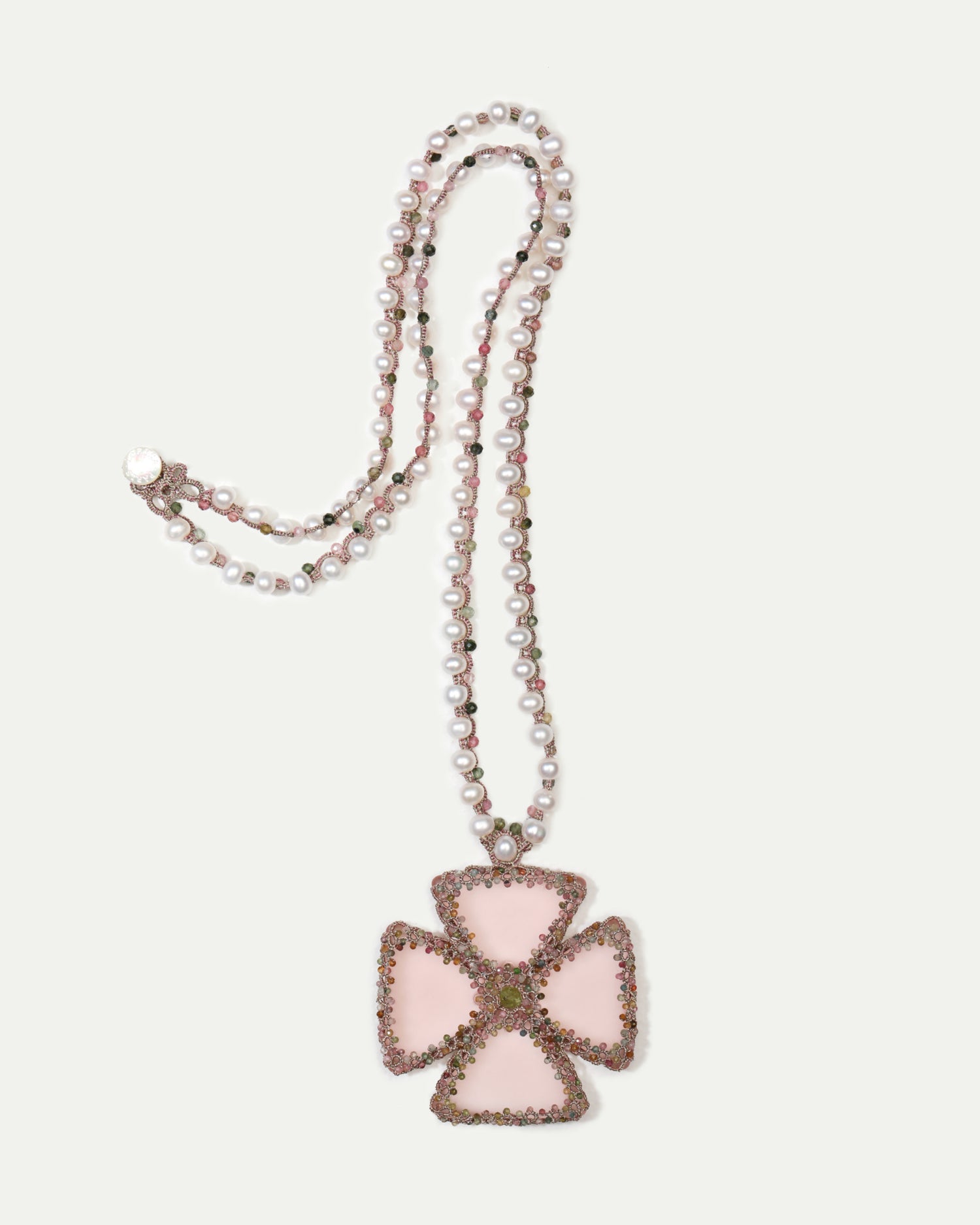 Georgia Pendant rose color, pearl beaded chain, side view, intricate design, cross shape, delicate craftsmanship