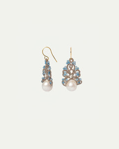 Blue silk and silver earrings with freshwater pearls and kyanite details, intricate design.