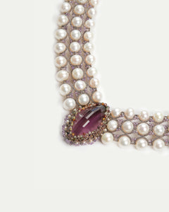 Rose silk necklace with freshwater pearls and sapphire detailing, amethyst centerpiece.