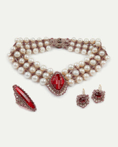 Red silk necklace with freshwater pearls and garnet detailing.