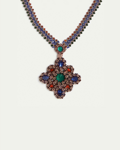 Multicolor LINDA necklace detail with silk, pearl, crystal, garnet, featuring intricate green and blue gemstones.