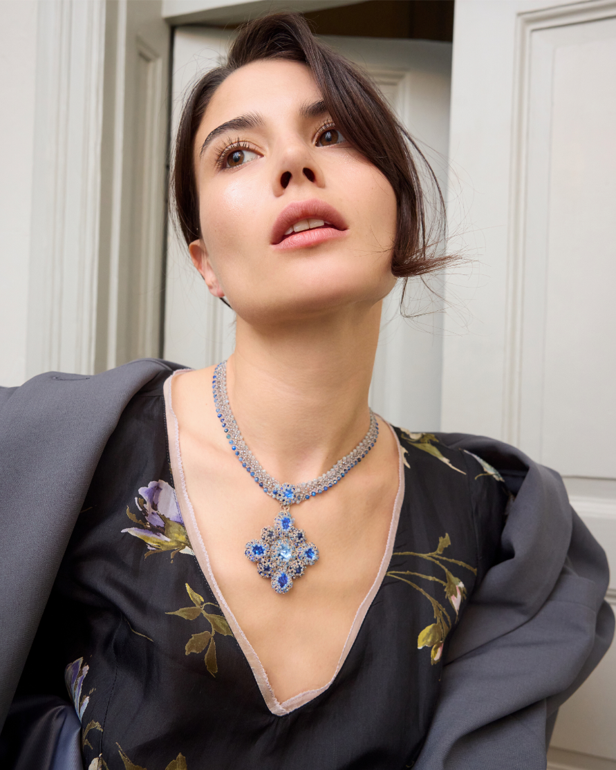 Blue LINDA NECKLACE with silk, pearl, crystal, kyanite, aquamarine; close-up showing intricate texture.