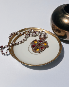 LYDIA NECKLACE in Silk, Pearl, Pearls color Yellow close-up view with premium look and attention to detail