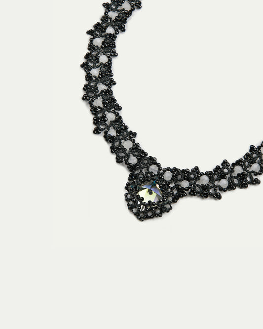 MARGUERITTE NECKLACE in Silk, Pearl, Crystal color Black side view with decorative details and quality finishes